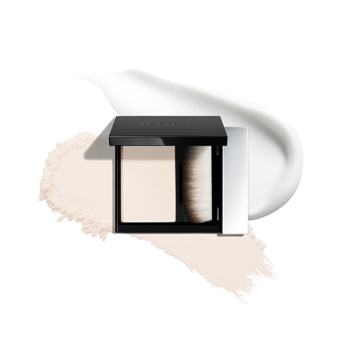 HERA front packaging showing compact travel-friendly primer and brush benefit