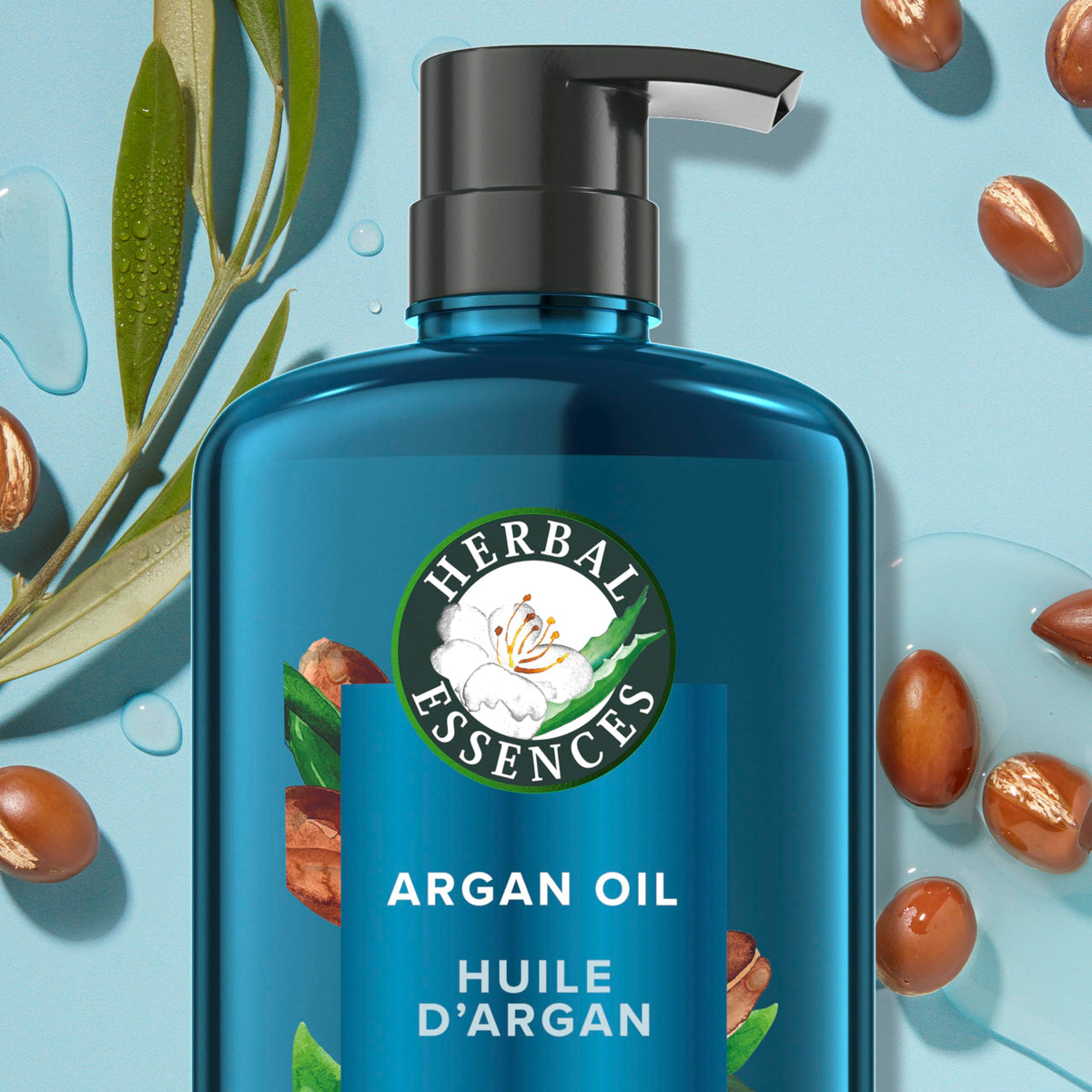 Herbal Essences conditioner bottle beside matching shampoo for routine benefit