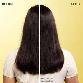 Herbal Essences conditioner in hands ready for application and detangling