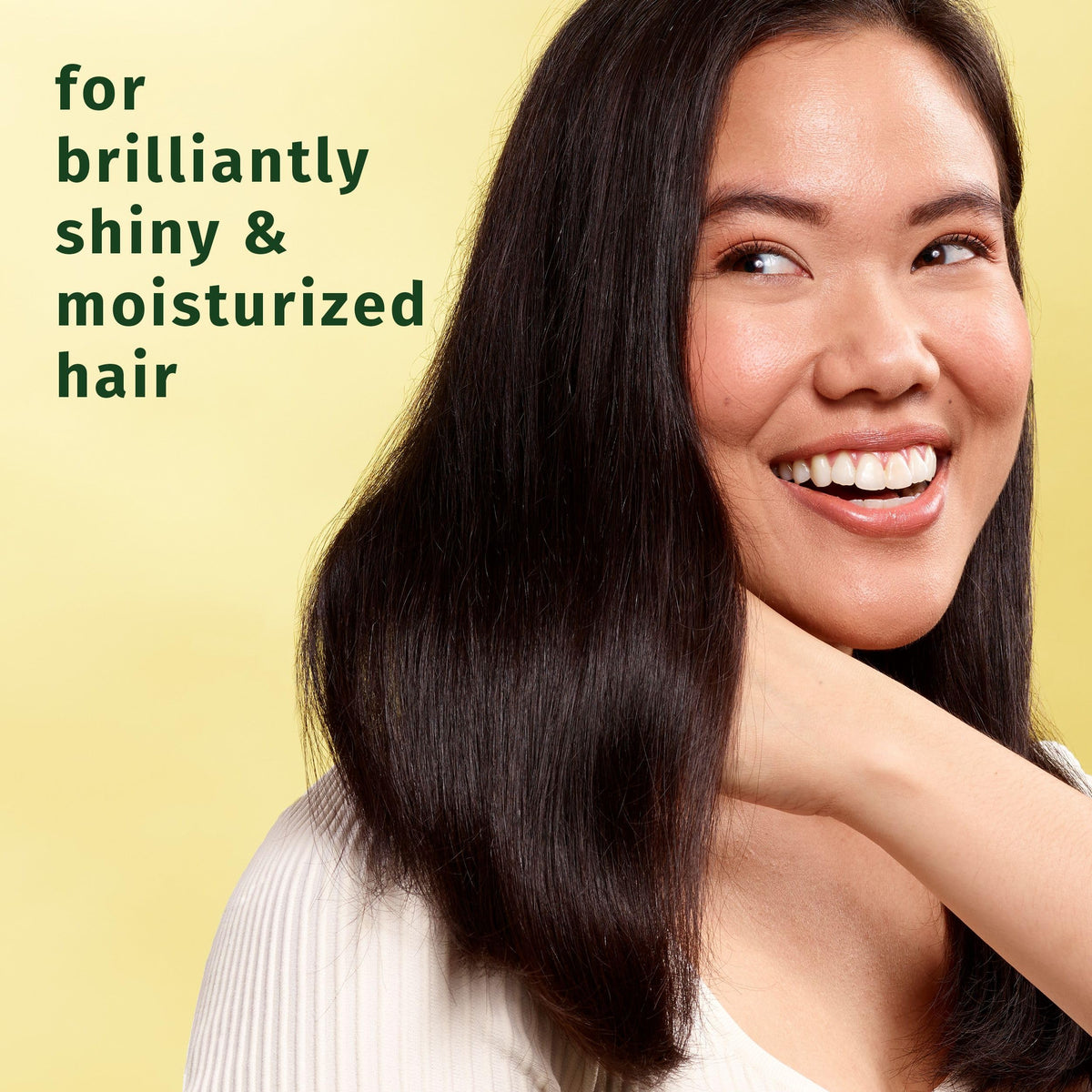 Herbal Essences conditioner creamy pour texture demonstrating easy spread