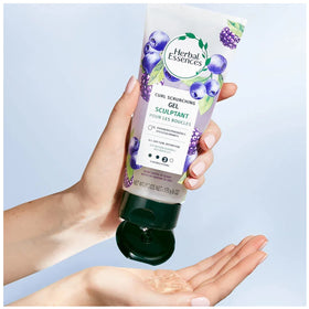 Herbal Essences gel being dispensed into hand for easy styling benefit