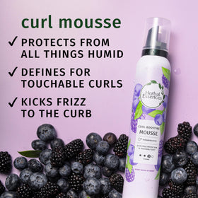 Herbal Essences foam texture close-up illustrating light, airy hold