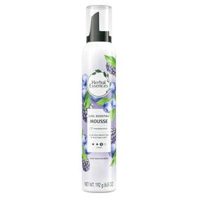 Herbal Essences mousse on bathroom shelf in lifestyle styling routine