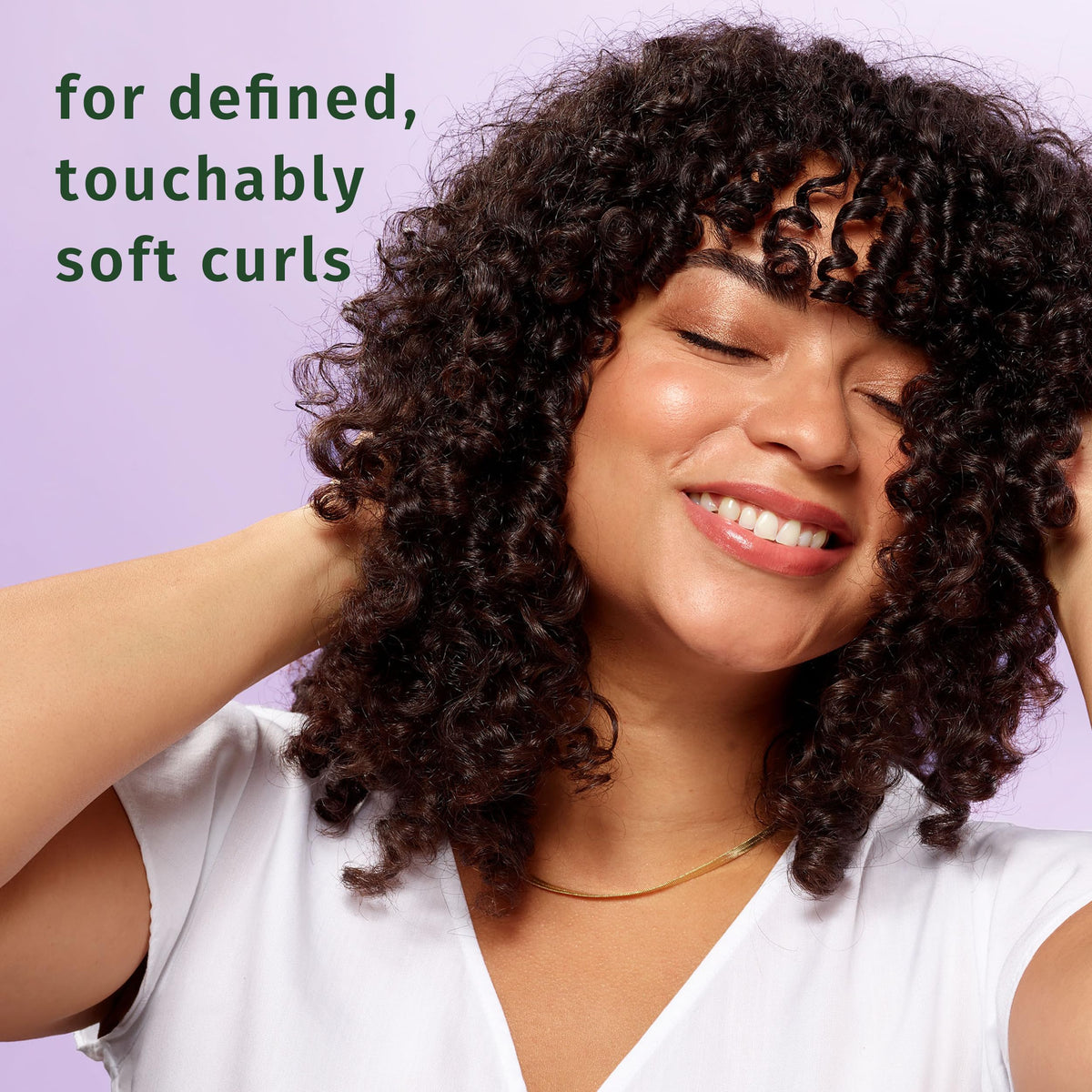 Herbal Essences mousse dispensed on palm ready for easy application
