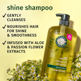 Herbal Essences label close-up featuring chamomile and aloe callouts for natural extracts.