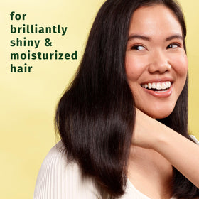 Herbal Essences shampoo pouring texture demonstrates lightweight lather and easy rinse.