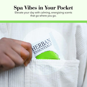 Herban Essentials wipe being used on hand providing quick cooling refresh