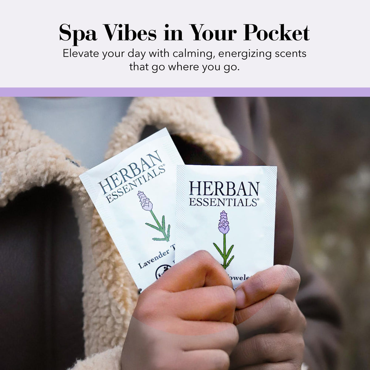 Herban Essentials wipe held in hand showing compact travel size and easy portability