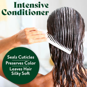 Herbatint conditioner creamy texture on hand demonstrating easy spread and detangling