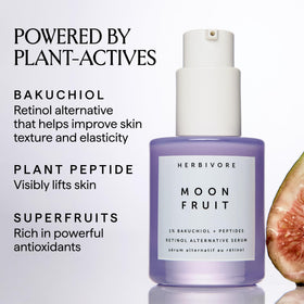 HERBIVORE Moon Fruit serum texture on fingertip highlighting lightweight spreadability