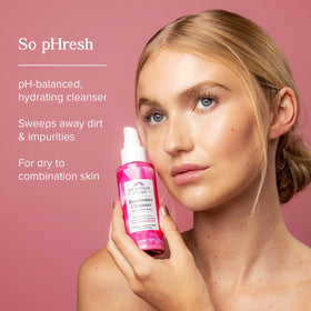 HERITAGE STORE creamy milk cleanser texture close-up highlighting moisturizing feel