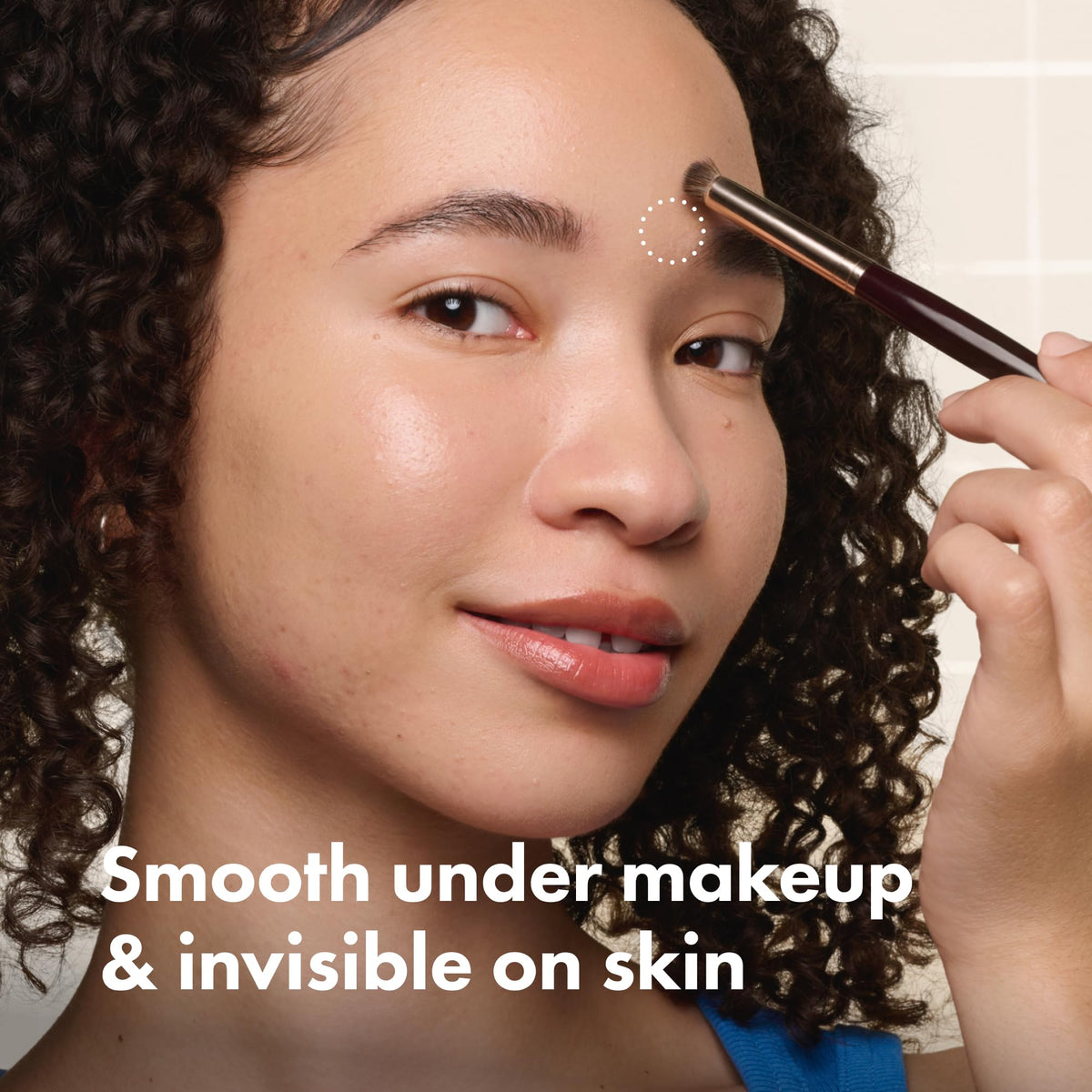 HERO COSMETICS applying Mighty Shield in nose crease for precise blemish coverage