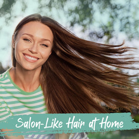 HerStyler label close-up displaying ingredients like biotin and argan for clarity benefit