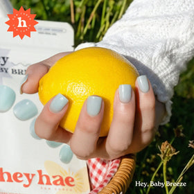 heyhae hands applying strip demonstrating warmth-and-stretch method for secure fit