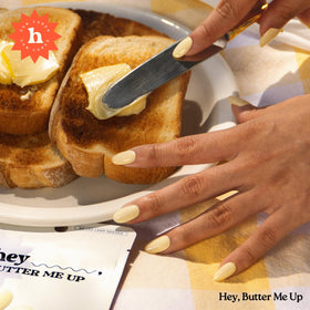 heyhae aligning a strip on a nail showing easy application benefit