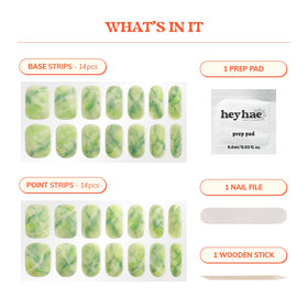 heyhae applied on nails in hands demonstrating salon-quality marble green look instantly