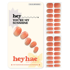 heyhae front packaging showing set and vibrant orange ombre nails benefit instant-ready kit