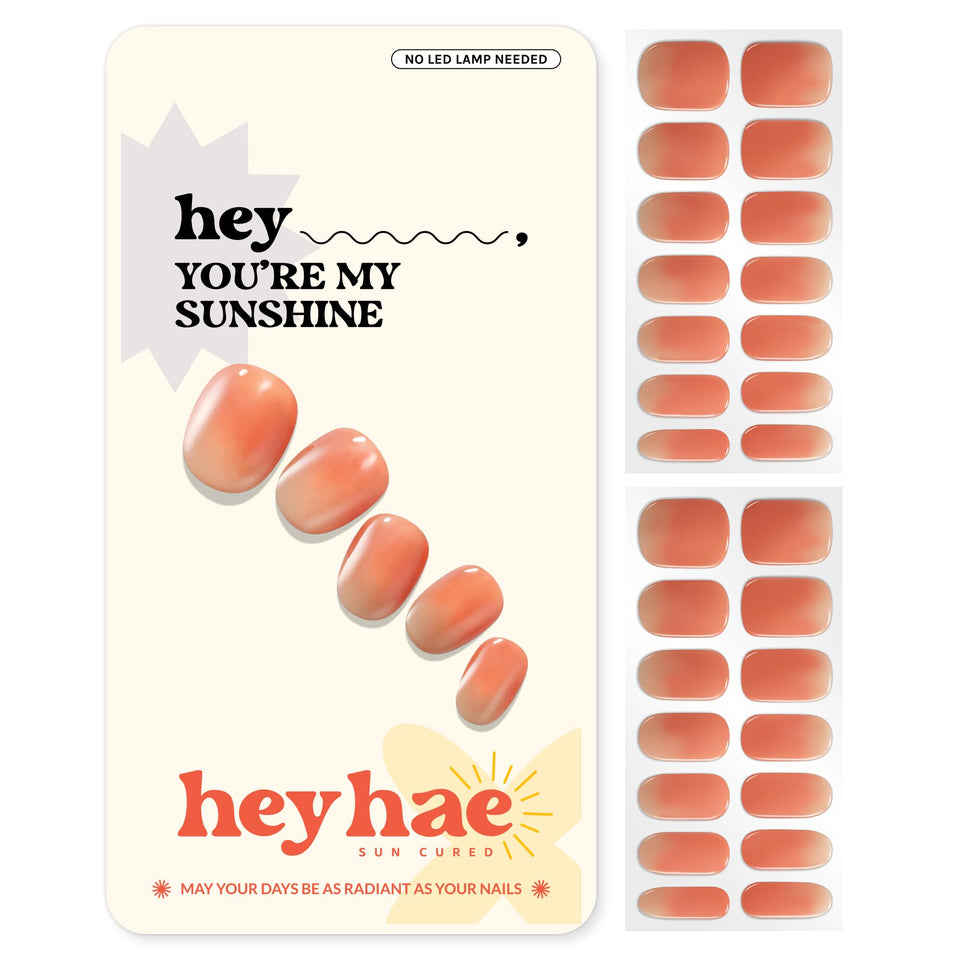 heyhae front packaging showing set and vibrant orange ombre nails benefit instant-ready kit
