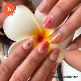 heyhae strips applied on fingers in lifestyle shot showing easy on-the-go manicure