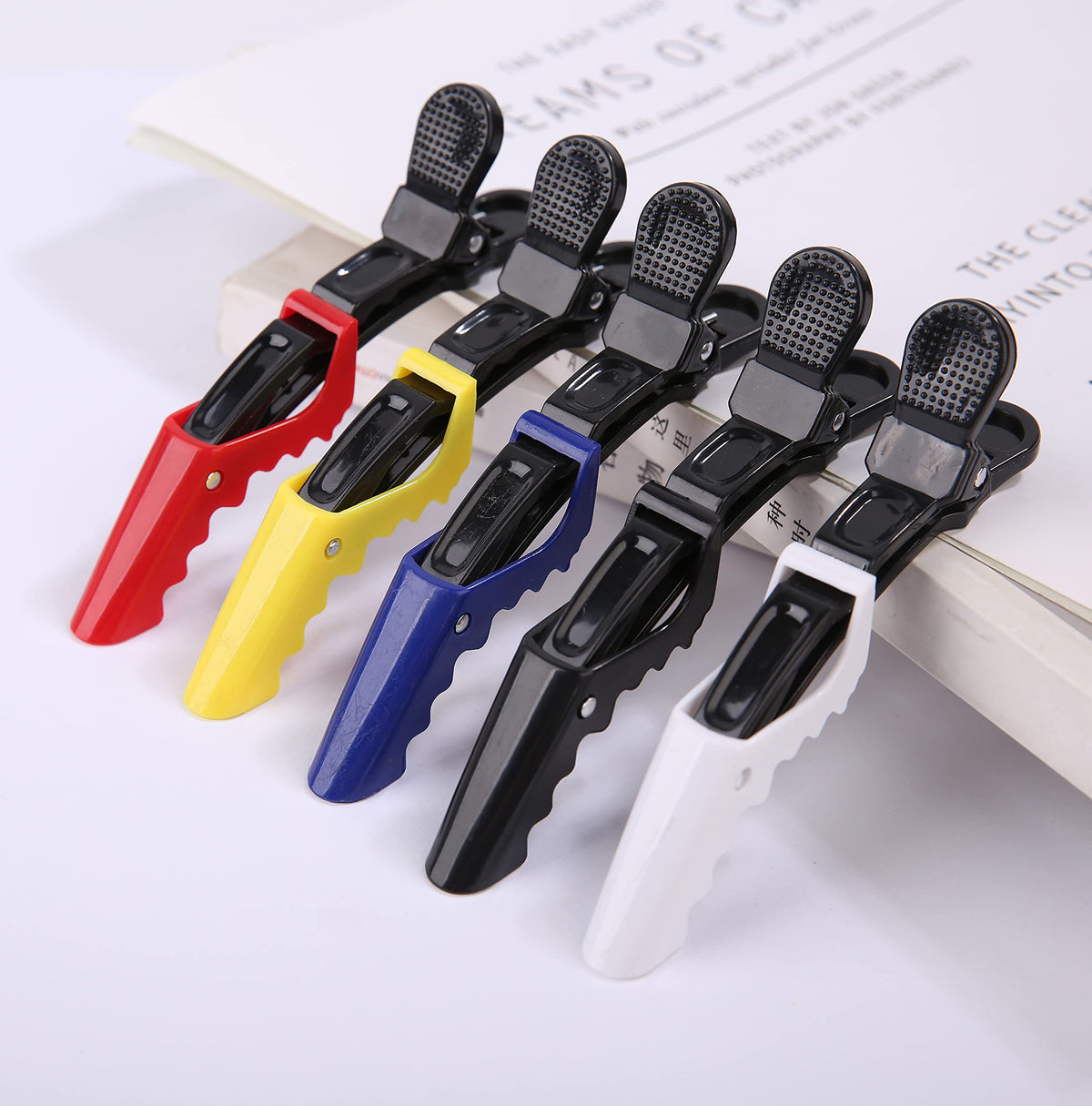 HH&LL clip holding thick curly hair demonstrating strong non-slip grip