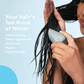 HiBAR bar being applied to wet hair for hydrating, tangle-free results