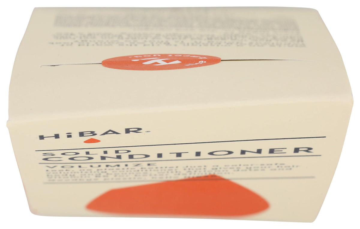 HiBAR volumize bar in hand indicating compact travel size benefit