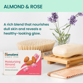 Himalaya soap bar in hand for scale showing travel-friendly size