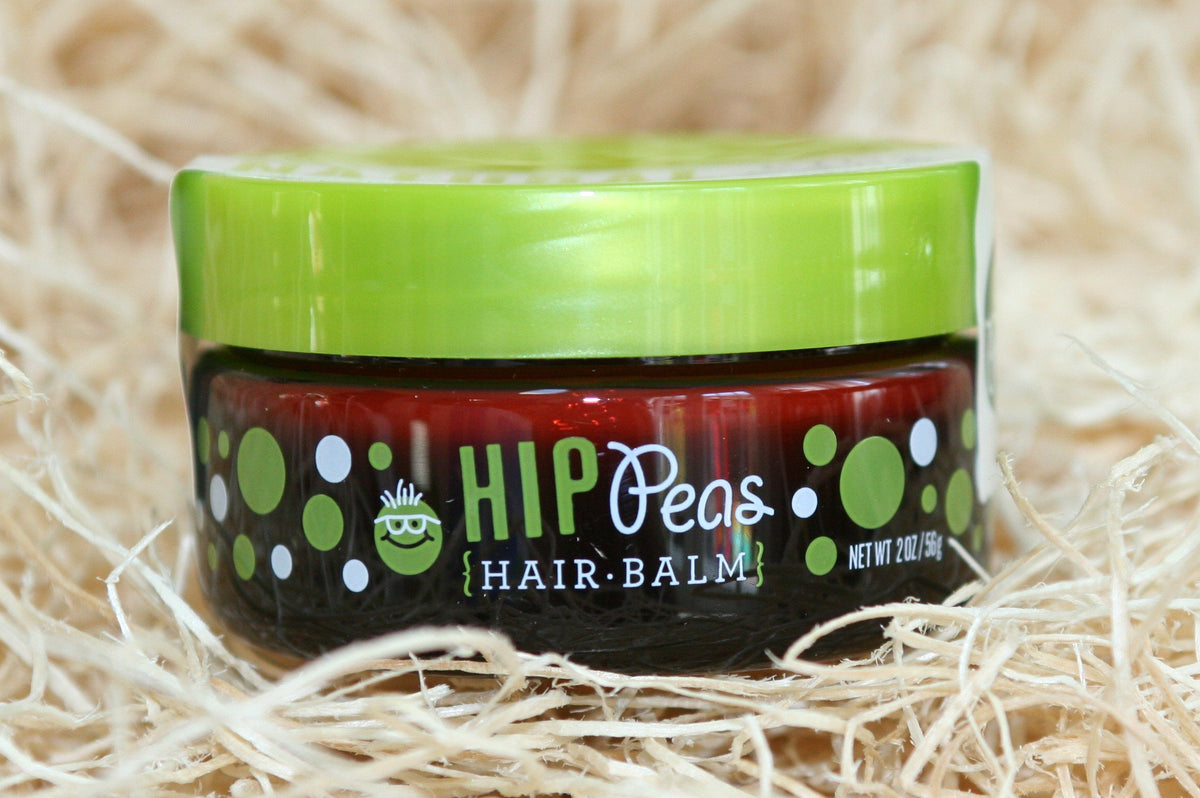 Hip Peas applied to child hair demonstrating gentle taming benefit