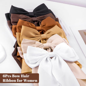 hisial bows styled in a flatlay with outfit pieces for outfit pairing
