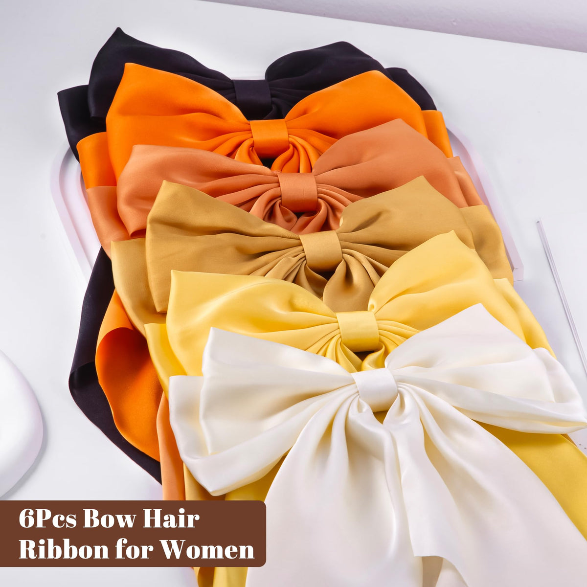 hisial bows arranged on table in lifestyle setup, suggests gifting and outfit coordination benefit