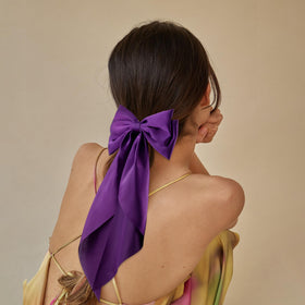 hisial bow held in hand showing scale and generous 13.7-inch length