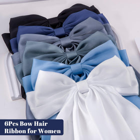 hisial bow attached to bag as accessory adding decorative flair