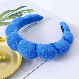 HitModa worn during face mask application keeping hair away and neat
