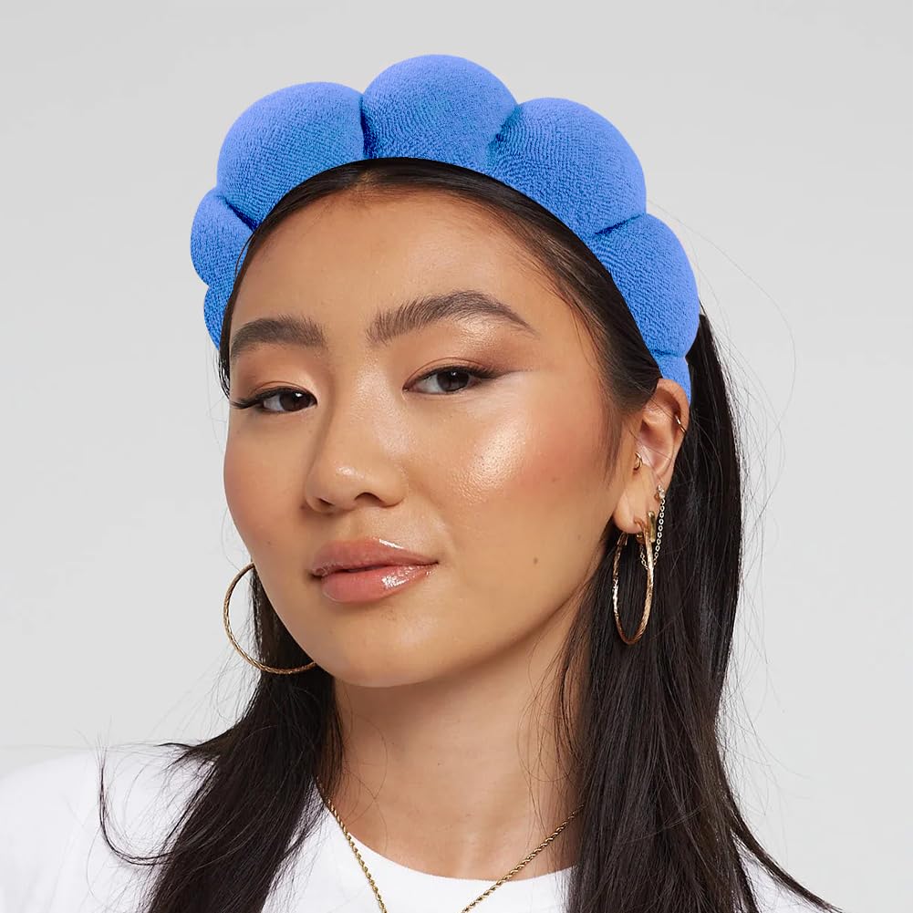 HitModa headband beside hand for size comparison illustrating generous coverage