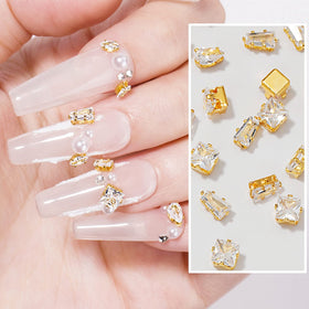 HNUIX charms placed on acrylic nail during application for secure fit