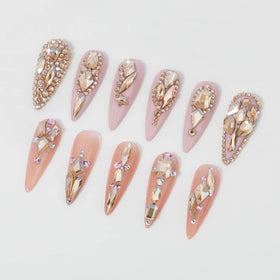 HNUIX rhinestones applied on nails creating a 3D manicure with lasting shine