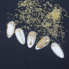 HNUIX on a finished nail accent displaying how beads enhance manicure detail