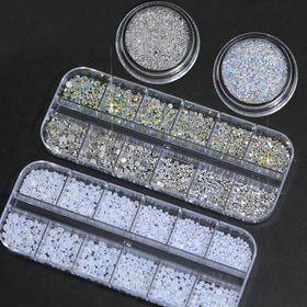 HNUIX rhinestones applied to an acrylic nail swatch demonstrating finished texture