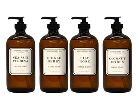 Home & Body Company four amber glass bottles front view for elegant sink décor