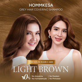 Hommkesa being applied to hair in shower for easy grey coverage