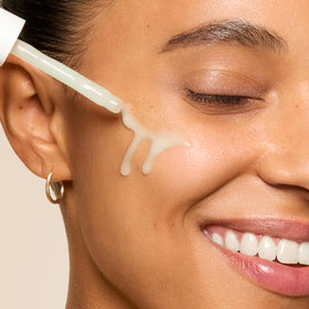 Honest Beauty serum in bathroom setting conveying everyday skincare integration