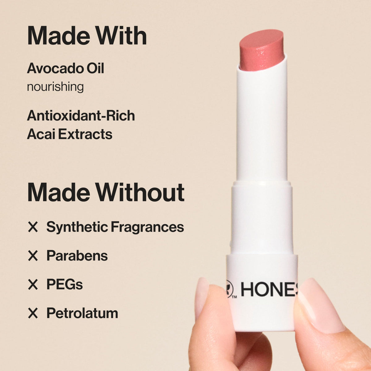Honest Beauty plum drop applied on model lips highlighting hydrated glossy finish