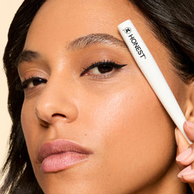 Honest Beauty removed with cotton pad showing easy removal and no flaky residue