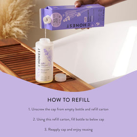 Parent and child enjoying bathtime with The Honest Company bubbles showing calming benefit