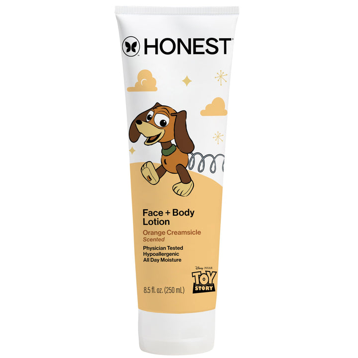 The Honest Company front packaging showing Orange Creamsicle scent and playful Toy Story art