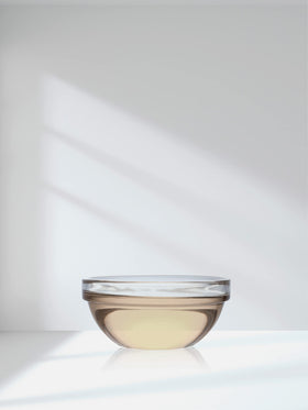 Horbäach bottles staged on a bathroom shelf, portraying daily routine integration and clean-beauty vibe