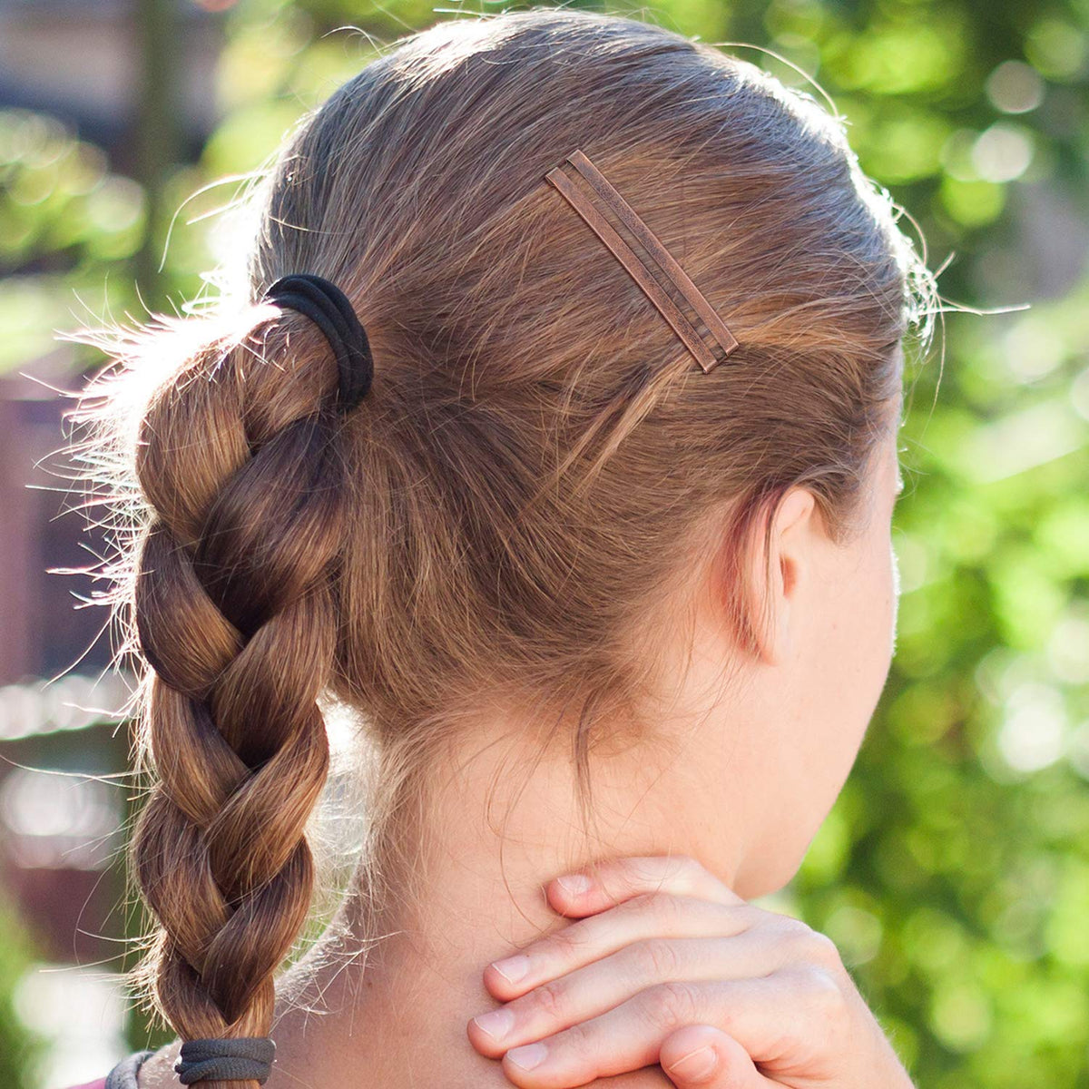 Hotop lifestyle image wearing barrettes for polished everyday look