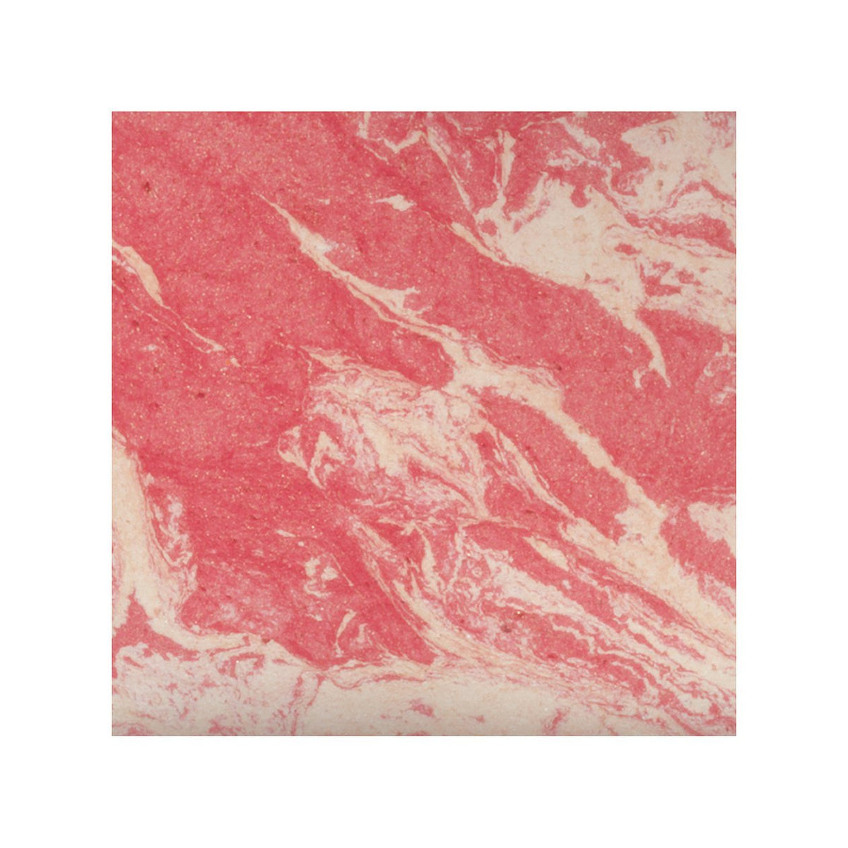 HOURGLASS close-up of swirled blush texture demonstrating light-reflecting, blendable finish