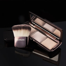 HOURGLASS in-use application on cheek demonstrating natural luminous benefit
