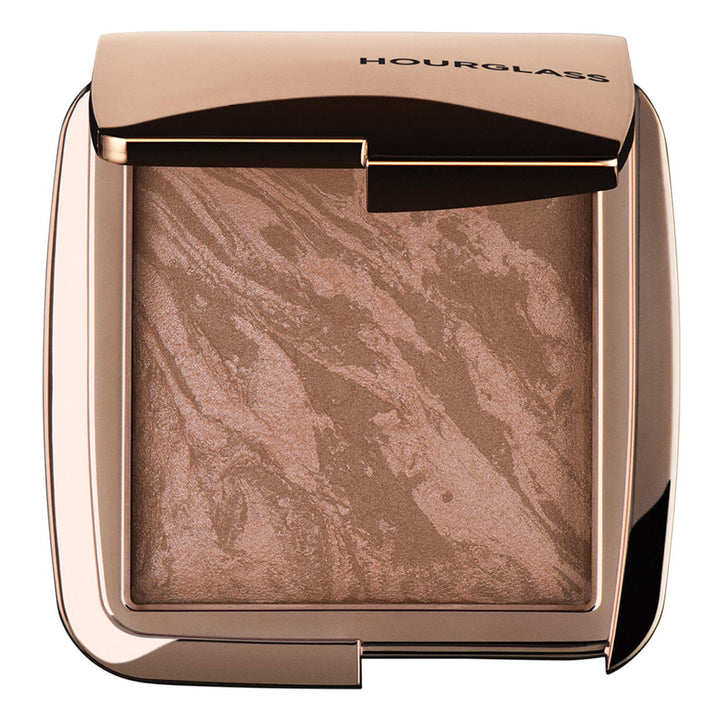 Hourglass front compact showing product and brand for effortless glow